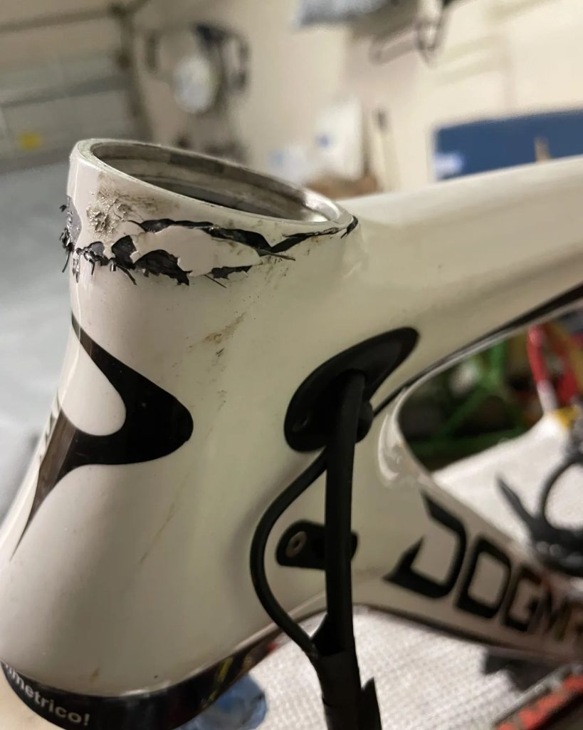 Before: This Pinarello Dogma had extensive carbon damage on the head tube that other shops wouldn't accept for repair.